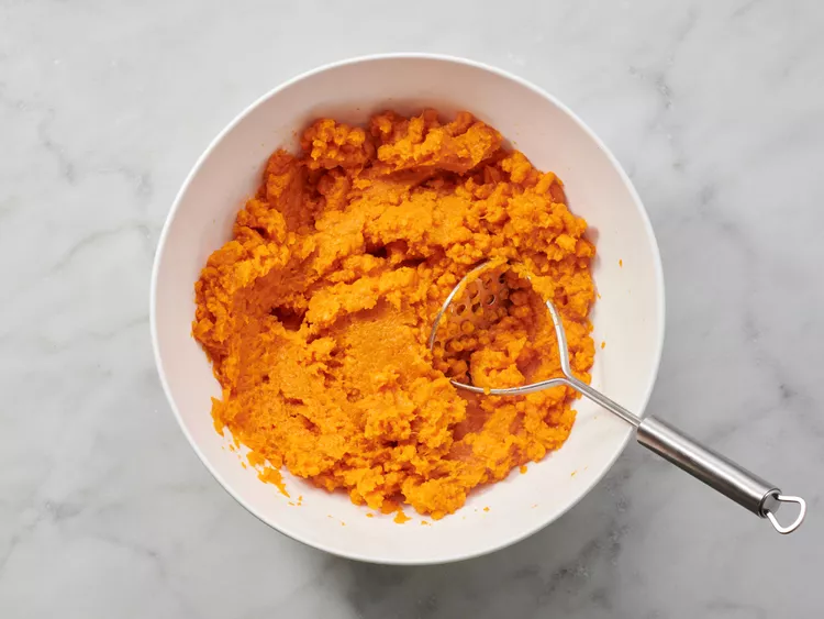 Mashed sweet potatoes with butter and sugar, prepared for the casserole filling